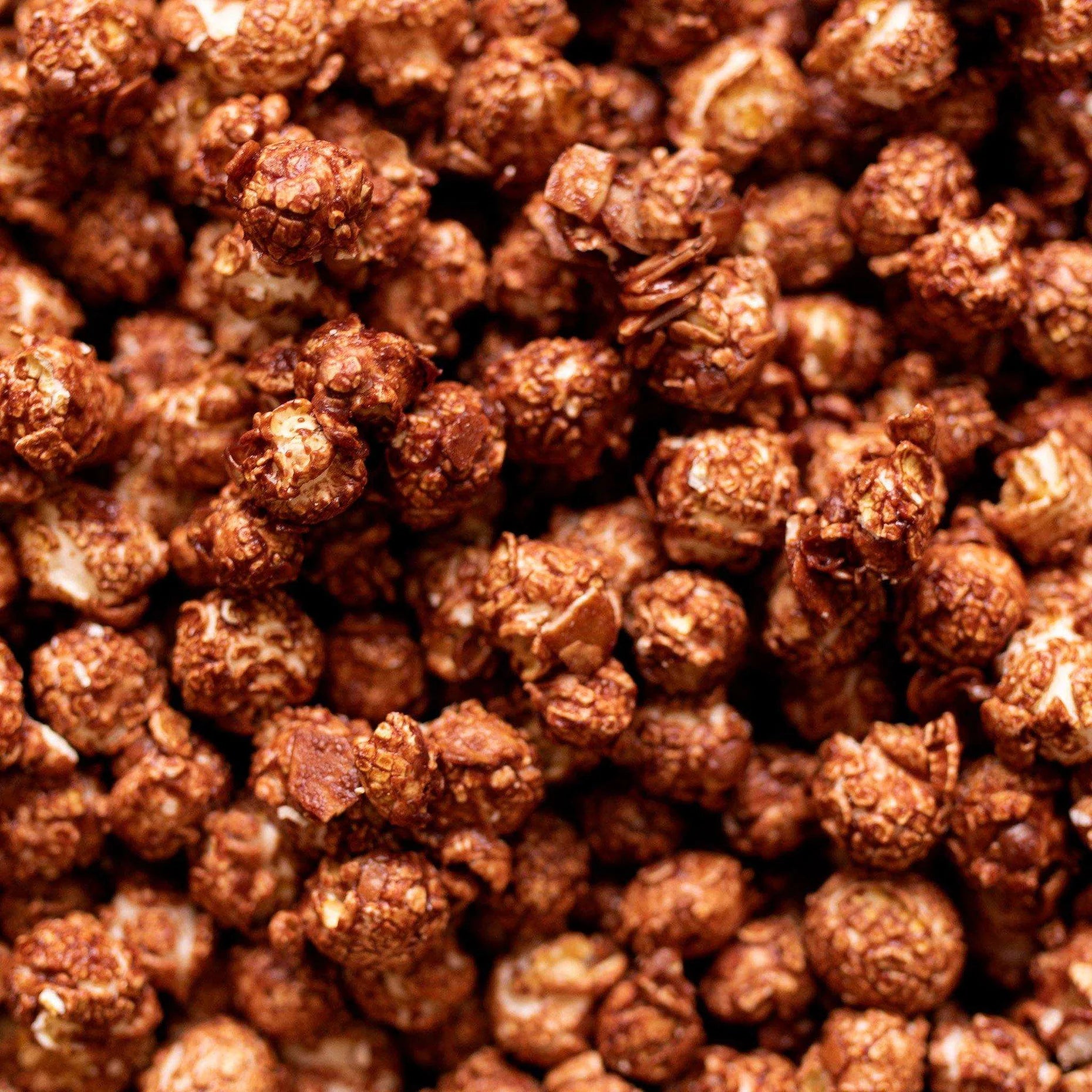 Knalle Popkorn Dunkle Schokolade geröstete Mandel, vegan
