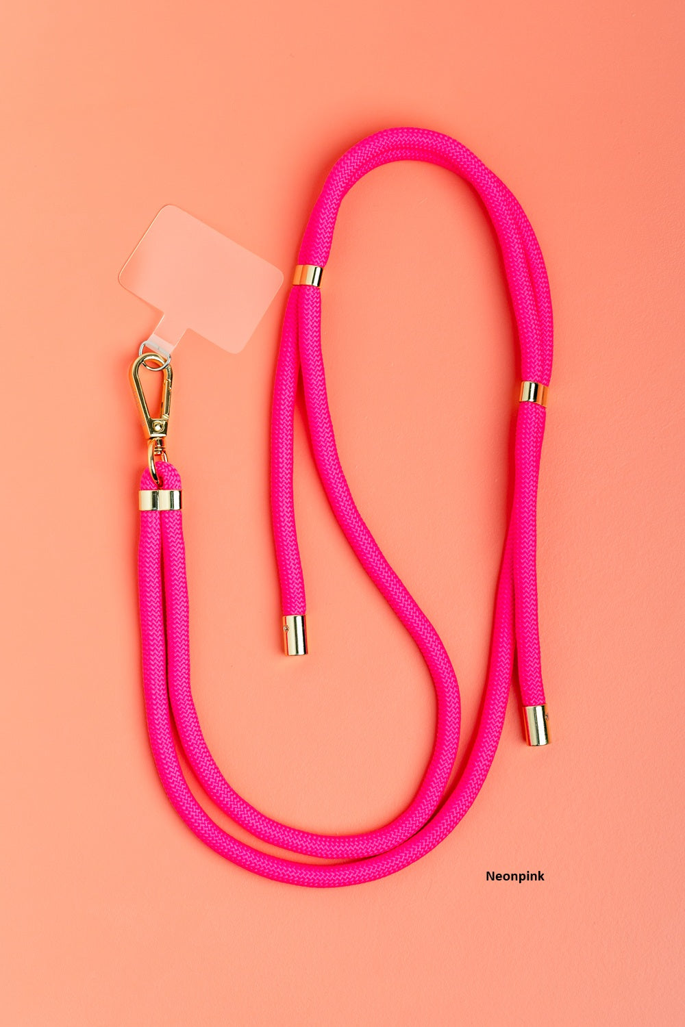 Ohhhwelll Handykette in Neonpink mit goldfarbenen Details und transparentem Phone Patch für Smartphones, modische Handykette zum Umhängen für Alltag und Freizeit.